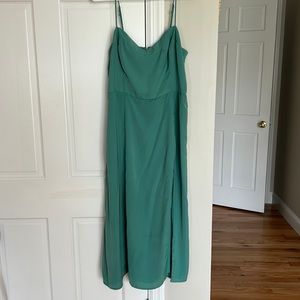 Emerald green midi dress with leg slit